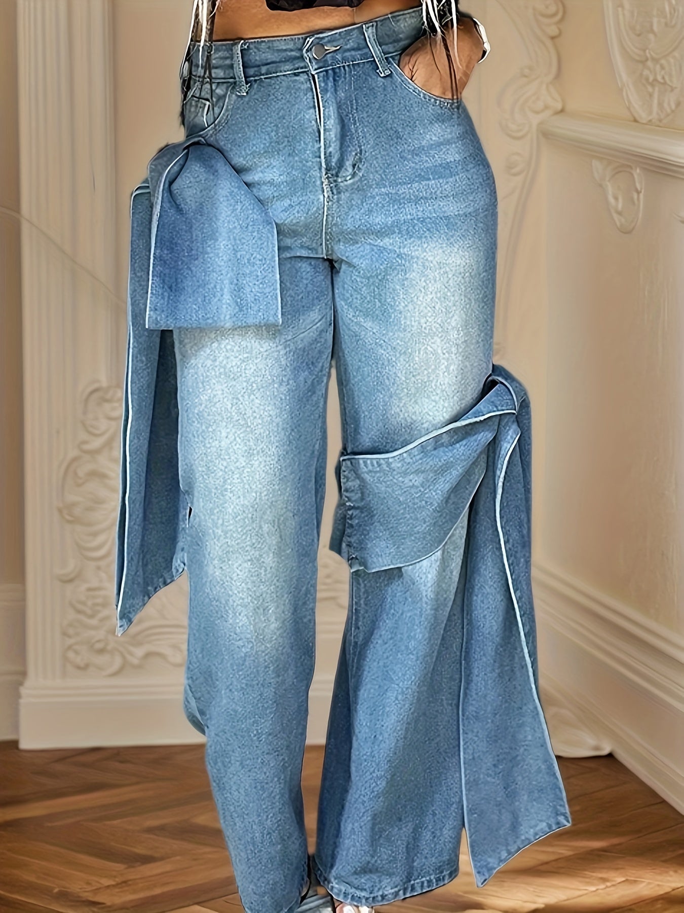 Blue wide leg jeans, bow-tie on both sides of the design sense, leisure out four seasons
